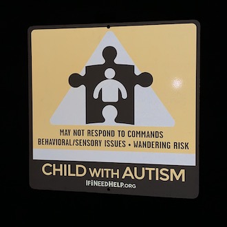 Reflective Child Autism Sign